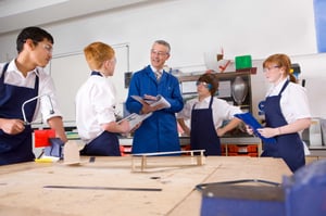 teacher-with-high-school-students-in-design-and-te-2026-01-11-09-43-26-utc